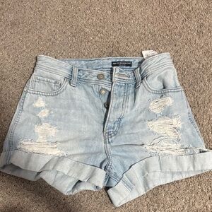 High-Rise Light Blue Distressed Denim Shorts